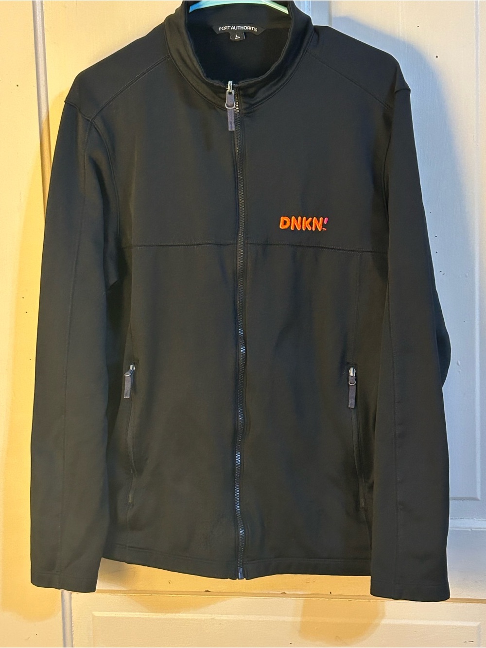 Port Authority Black Softshell Jacket with Orange DNKN' Accent